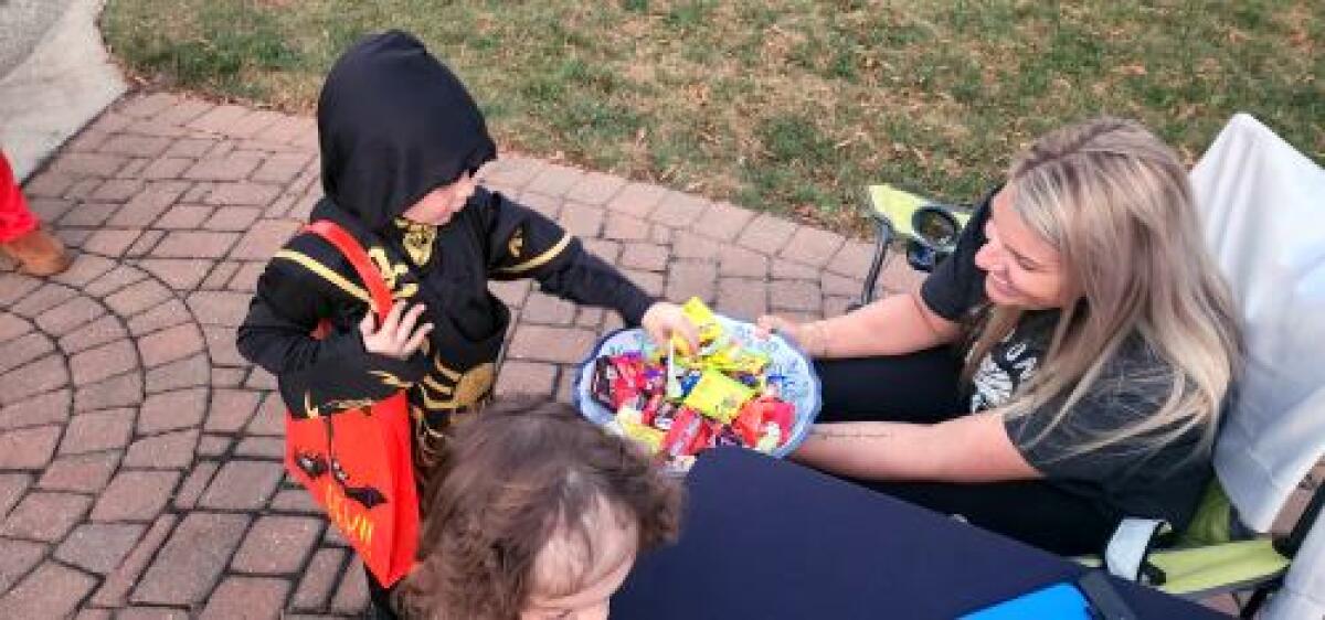 Halloween Night in Lincolnton: Trick-or-Treaters Fill the Streets in Search of Candy